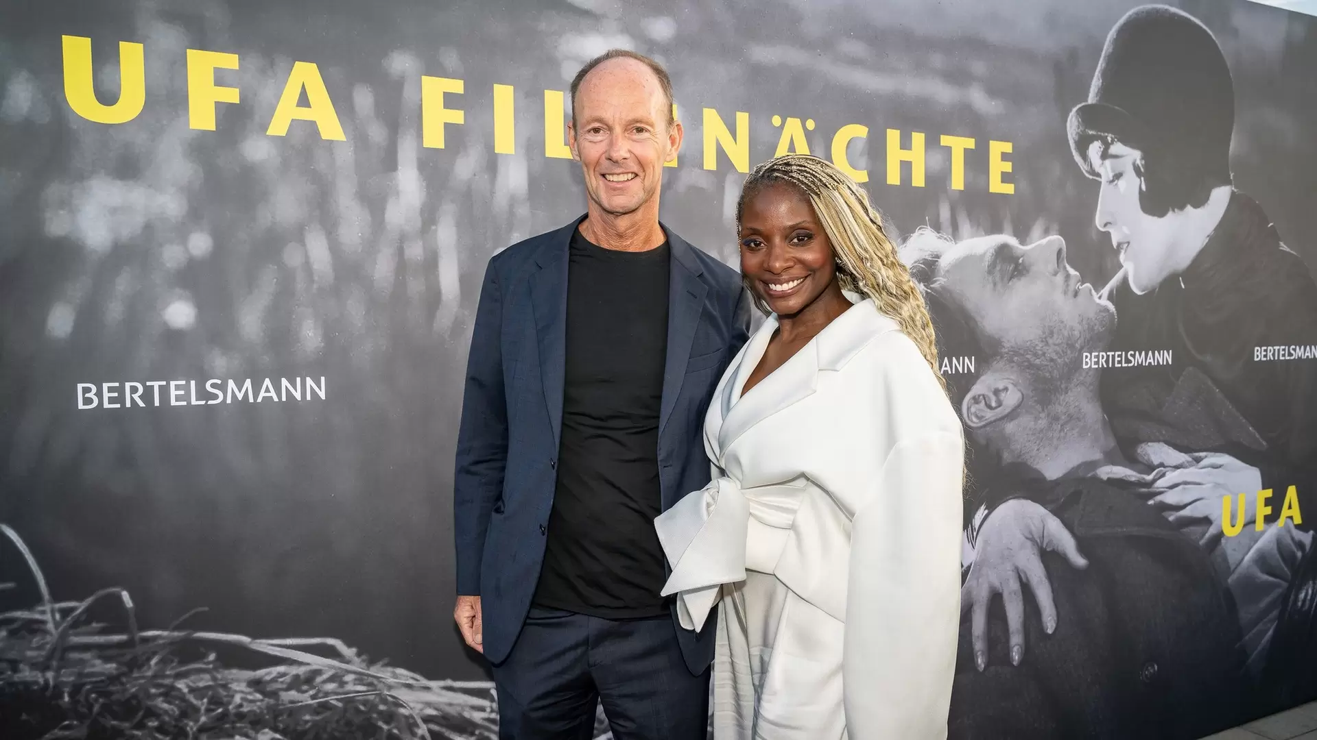 Film patron Nikeata Thompson and Bertelsmann CEO Thomas Rabe at the reception for the 2026 UFA Film Nights