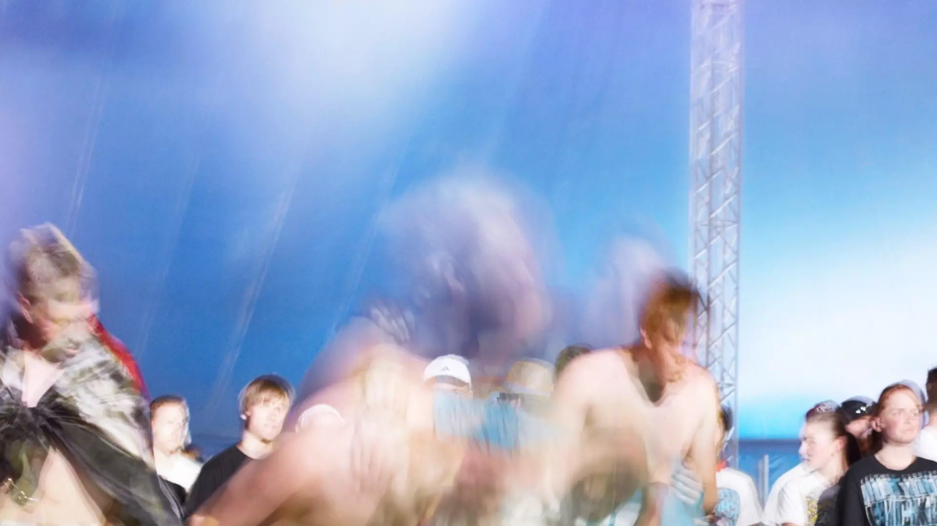 Blurry photo of a crowd at a concert