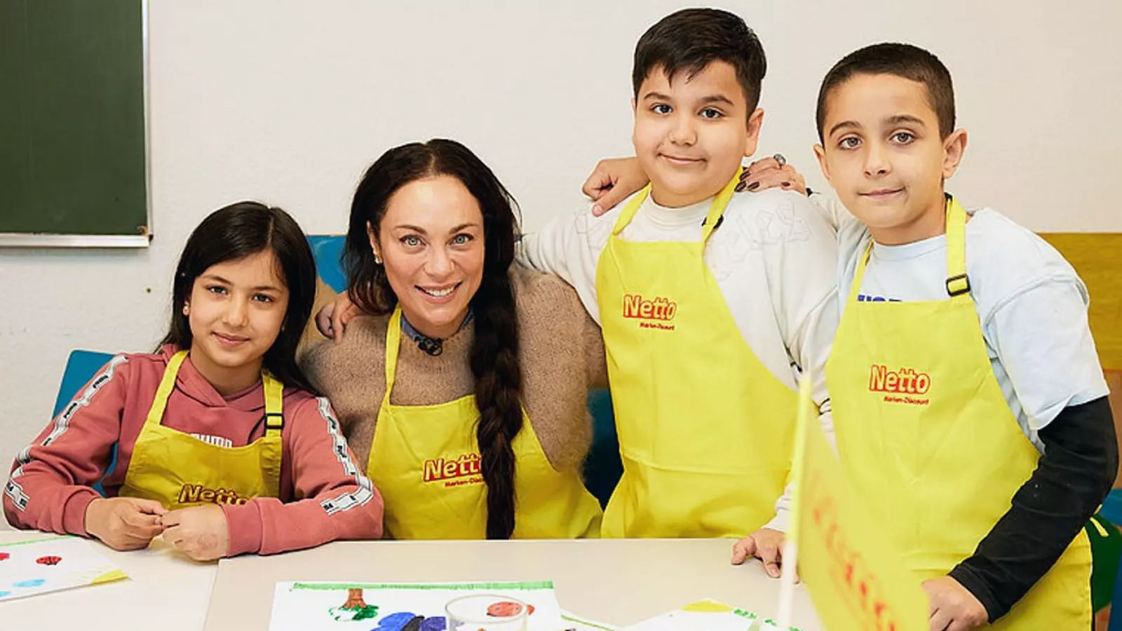 Lilly Becker with three children