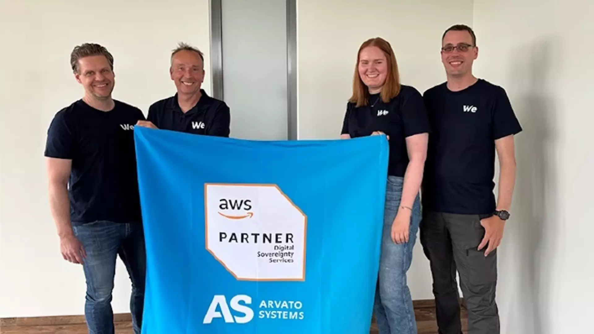 Arvato Systems employees holding an AWS partner
