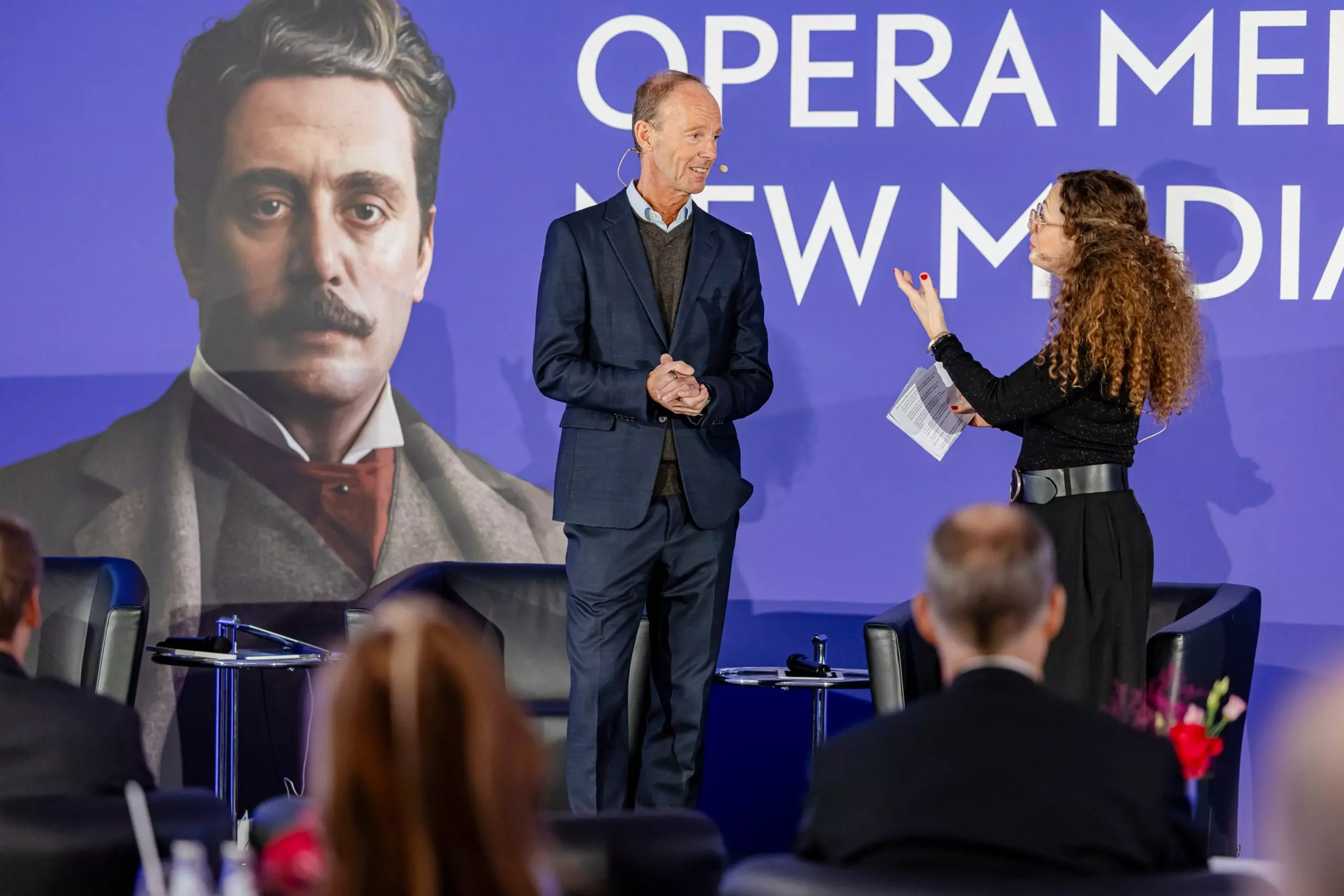 Thomas Rabe in conversation with presenter Shelly Kupferberg on stage