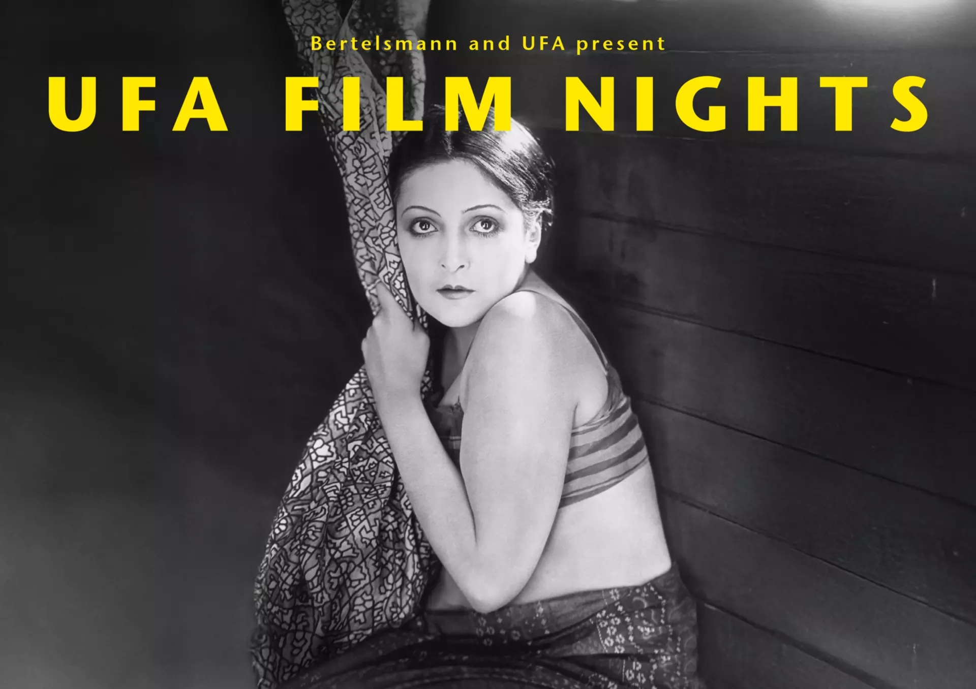 Filmplakat für die UFA Filmnächte 2025 mit einem Ausschnitt aus dem Stummfilm "Varieté"