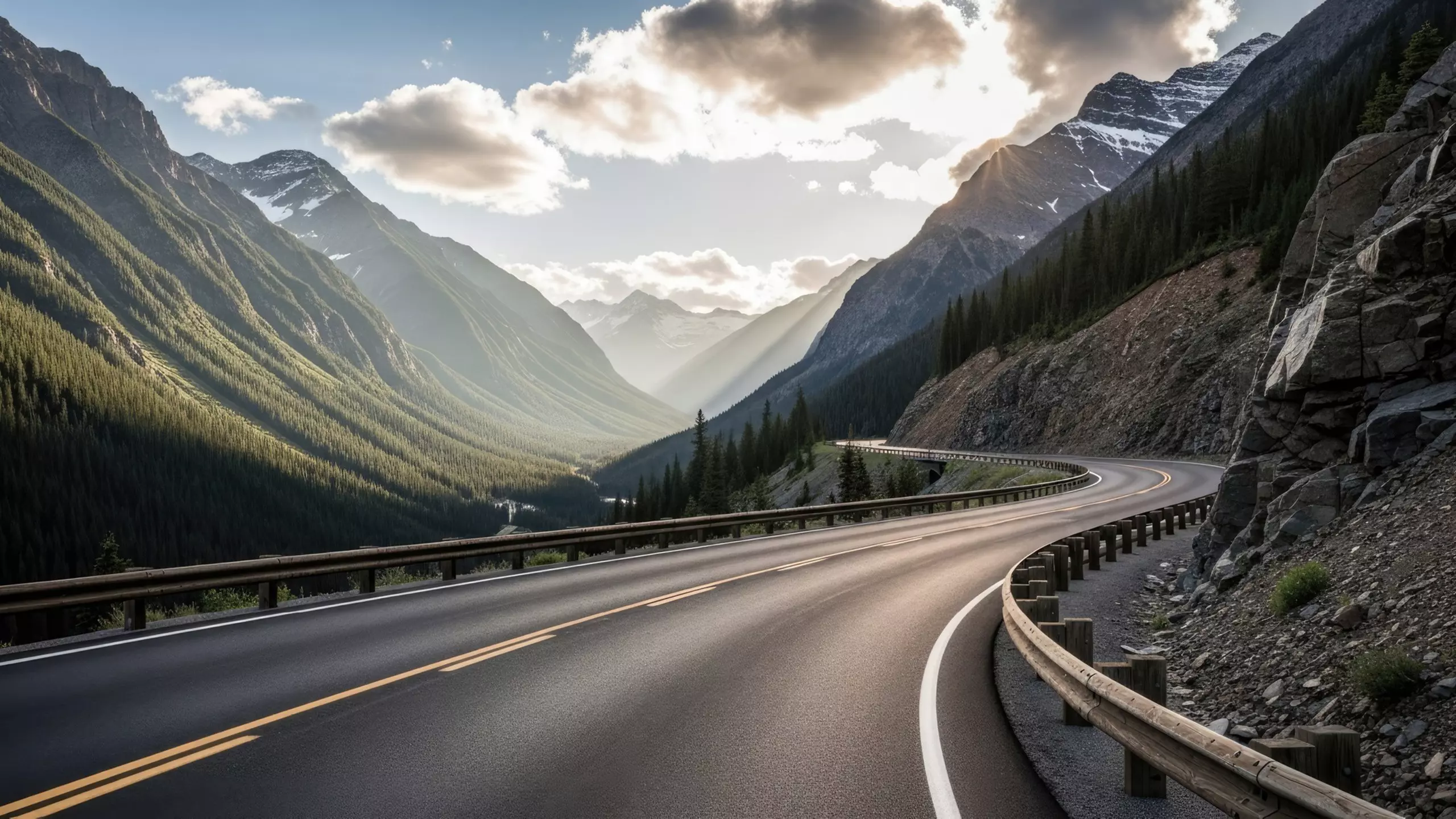 Winding road leads through mountain valley in evening light; symbolic of orientation and internal guidelines.