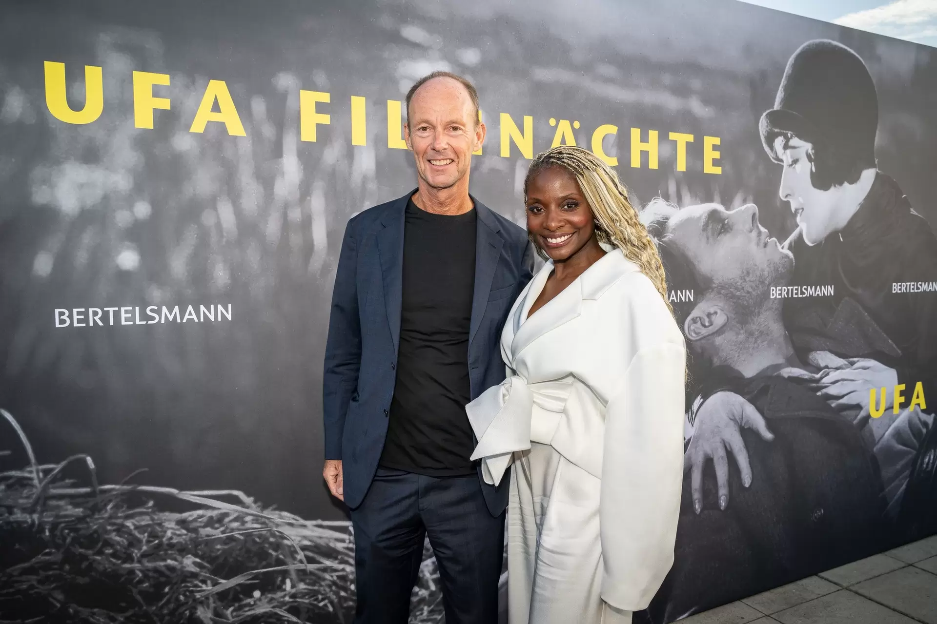 Film patron Nikeata Thompson and Bertelsmann CEO Thomas Rabe at the reception for the 2026 UFA Film Nights