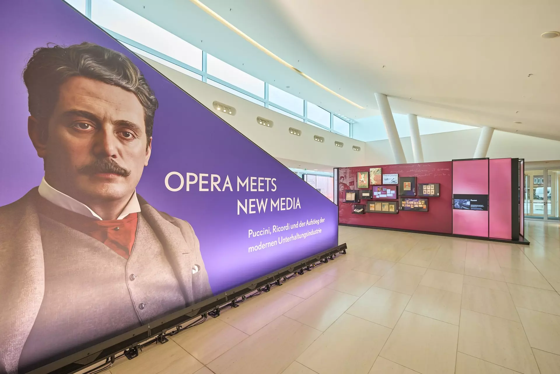 View from the theater entrance into the foyer with exhibition modules from the Puccini exhibition