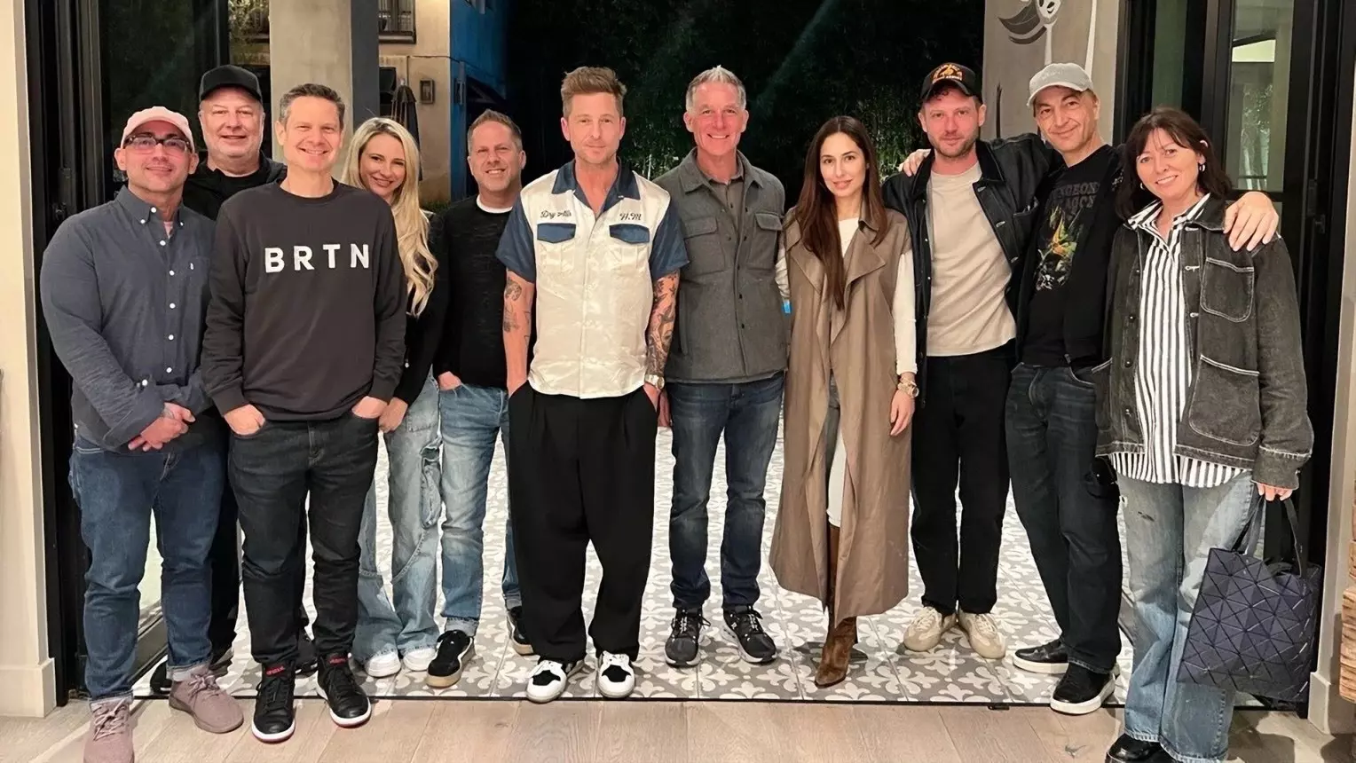 Group photo of OneRepublic and BMG management
