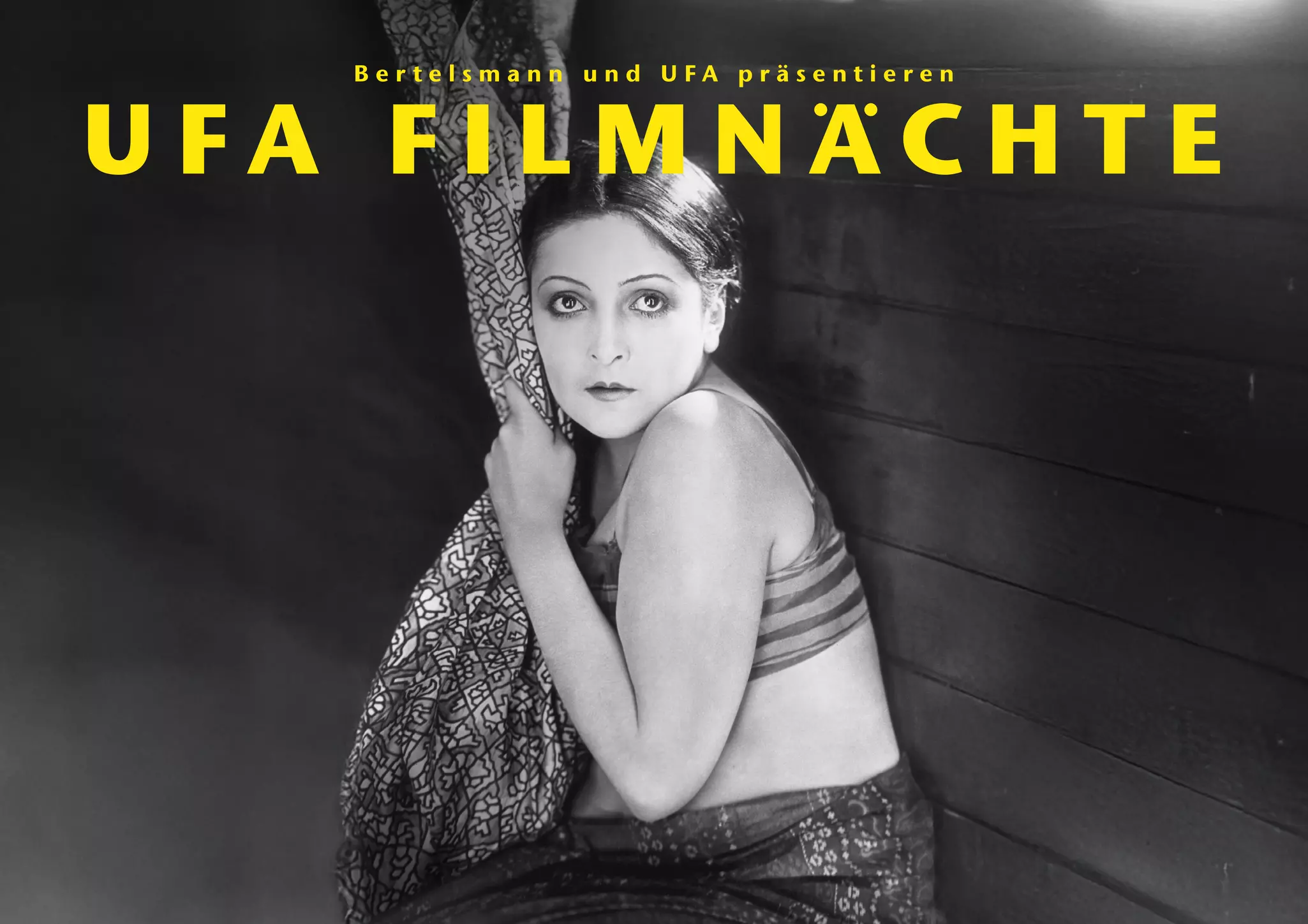 Filmplakat für die UFA Filmnächte 2025 mit einem Ausschnitt aus dem Stummfilm "Varieté"