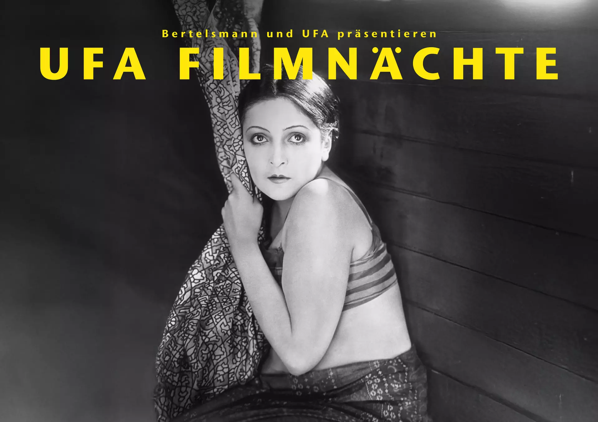 Filmplakat für die UFA Filmnächte 2025 mit einem Ausschnitt aus dem Stummfilm "Varieté"