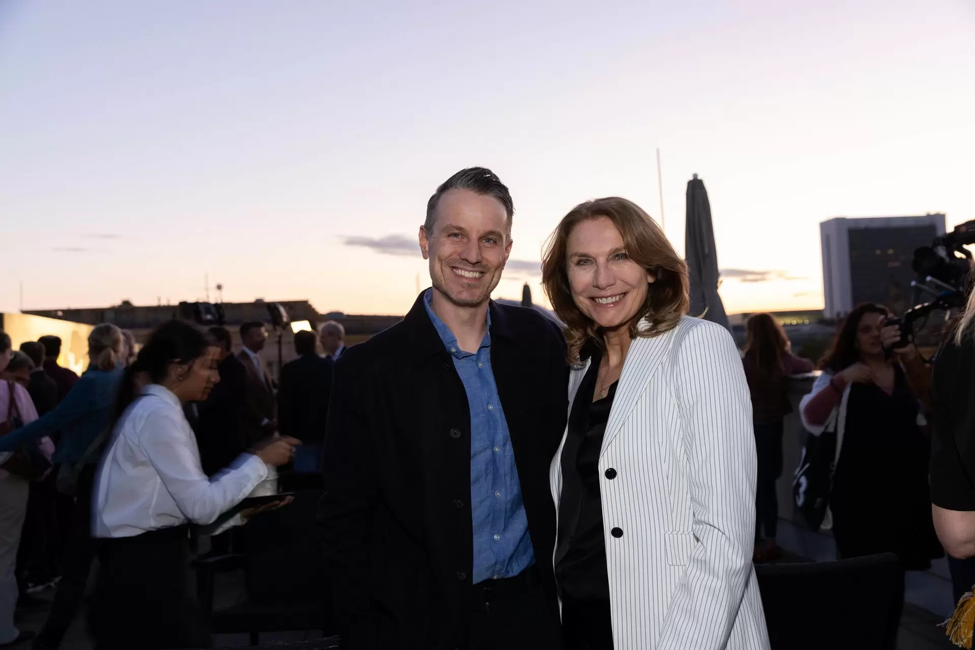 Actor Marc Dumitru and Karin Schlautmann, Executive Vice President Corporate Communications at Bertelsmann, at the reception for the 2026 UFA Film Nights