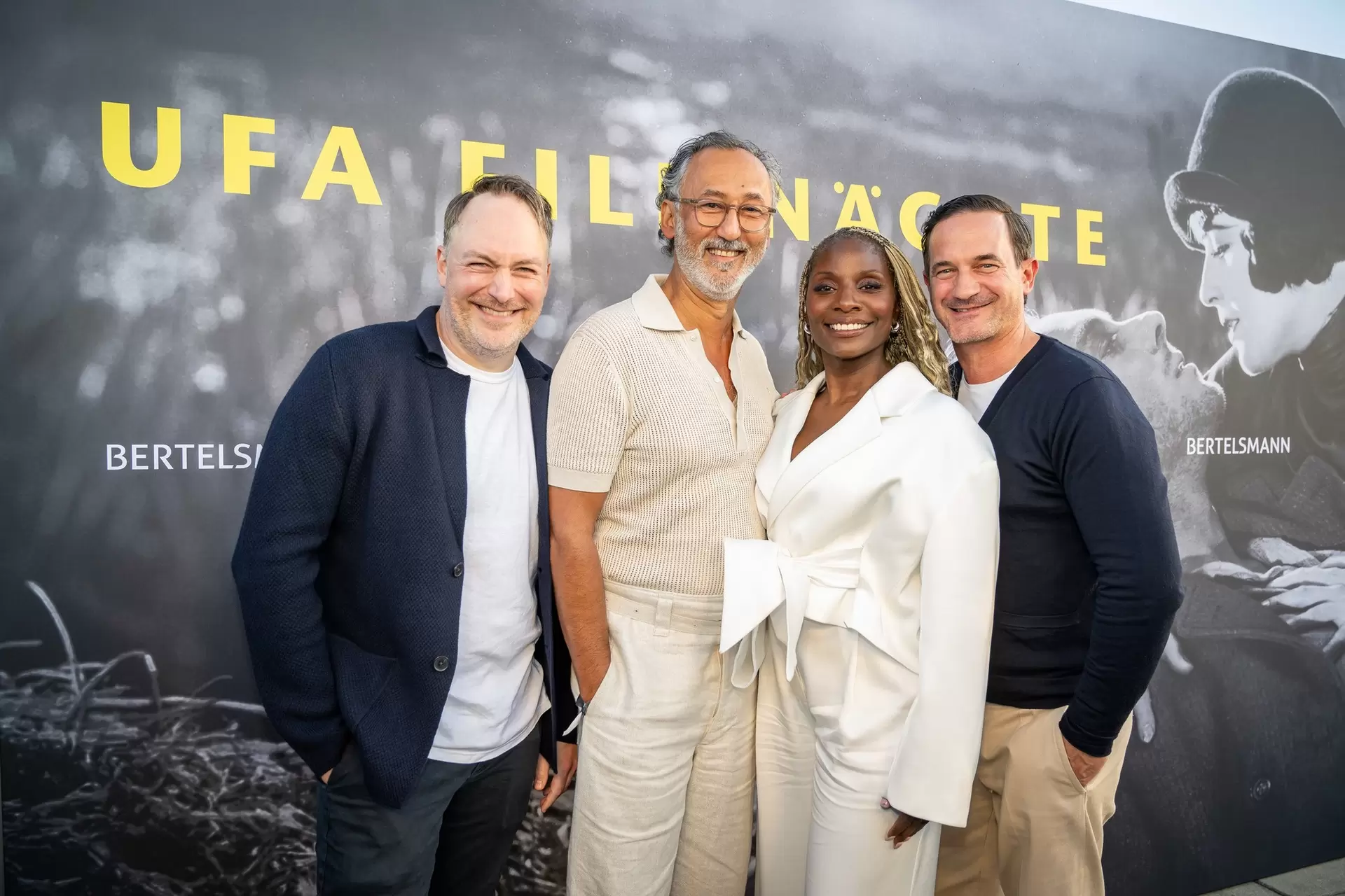 Martin Stange, Ercan Durmaz, Nikeata Thompson, and Söhnke Möhring at the reception for the 2026 UFA Film Nights