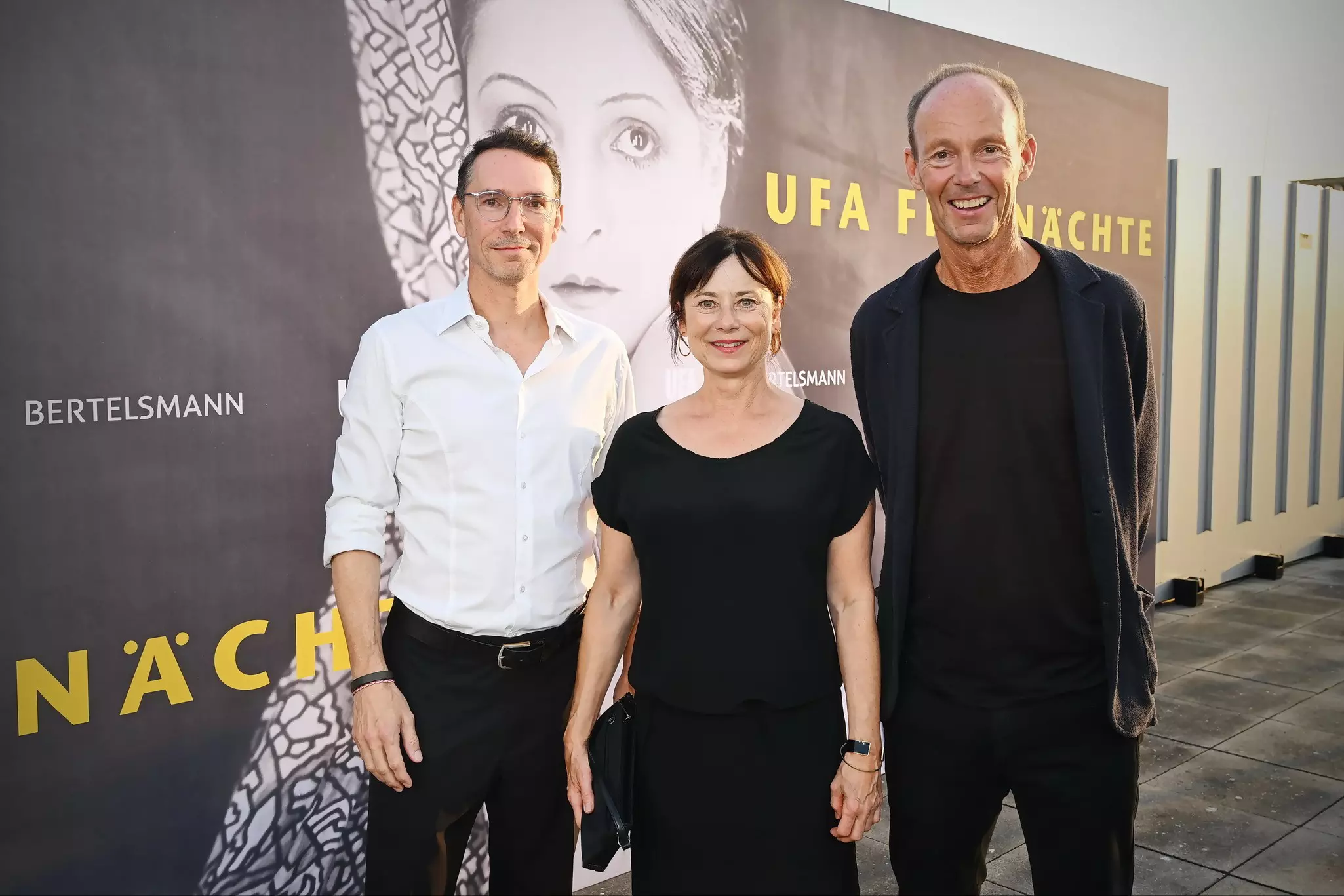 UFA-CEO Sascha Schwingel, Inka Friedrich, Patin der UFA Filmnächte 2025 und Bertelsmann-CEO Thomas Rabe